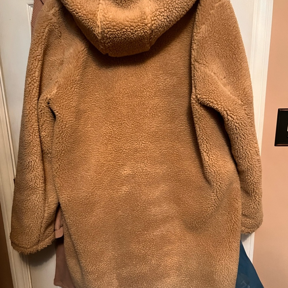 Warm and cozy teddy bear coat.
